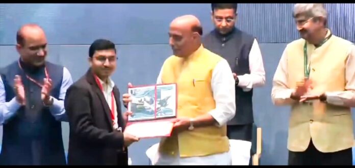 mp:-young-engineer-honoured-for-contributions-to-combat-drone-&-engine-manufacturing-by-defence-minister-rajnath-singh mp:-young-engineer-honoured-for-contributions-to-combat-drone-&-engine-manufacturing-by-defence-minister-rajnath-singh