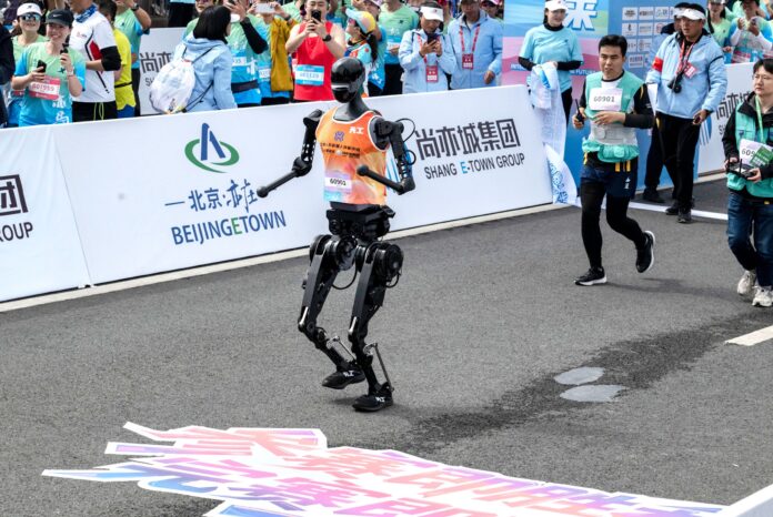 stumbling-and-overheating,-most-humanoid-robots-fail-to-finish-half-marathon-in-beijing