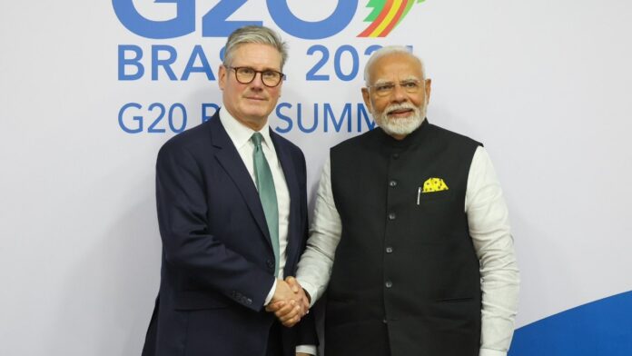 india-and-uk-clinch-trade-pact,-pm-modi-says-move-to-deepen-bilateral-ties